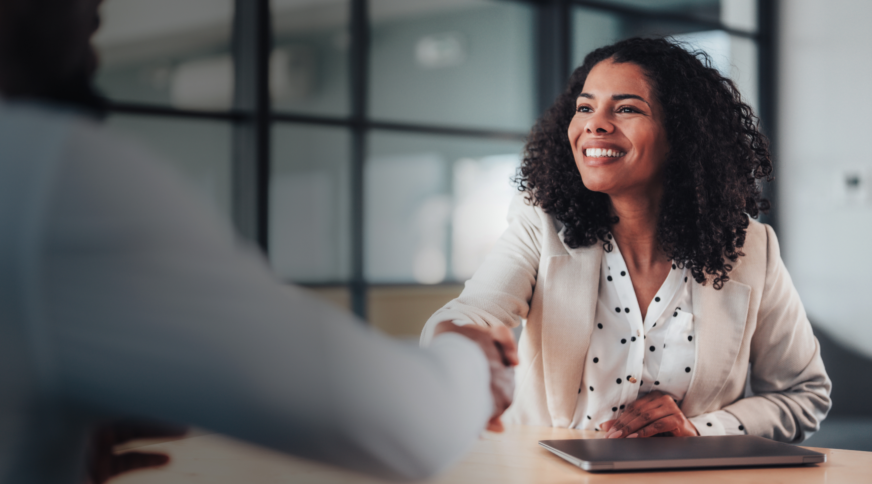 female-immigration-attorney-advising-multicultural-clients