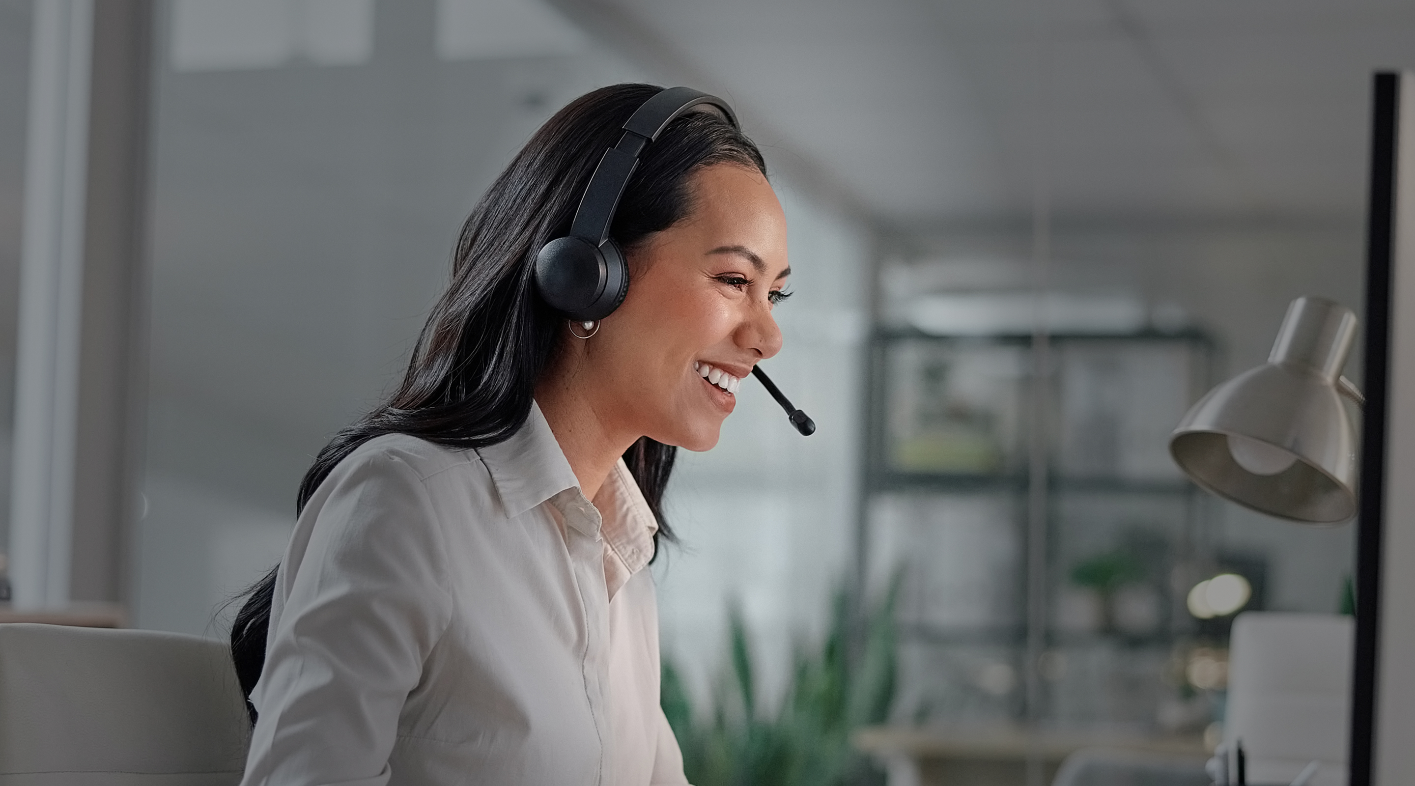 cheerful-female-telecommunications-agent-taking-calls