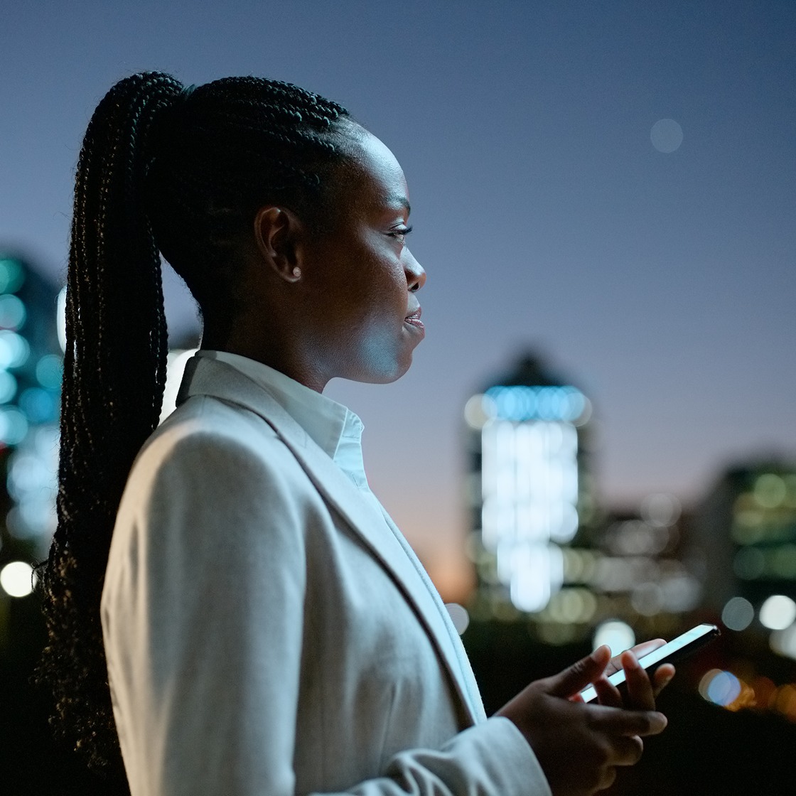 attorney-reviewing-after-hours-intake-messages-on-smartphone