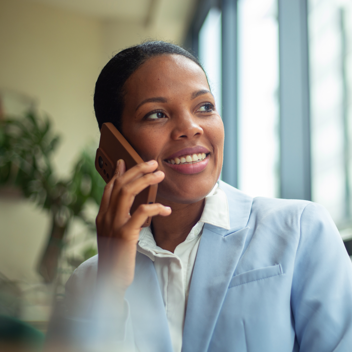 female-advocate-holding-phone-meeting-at-office