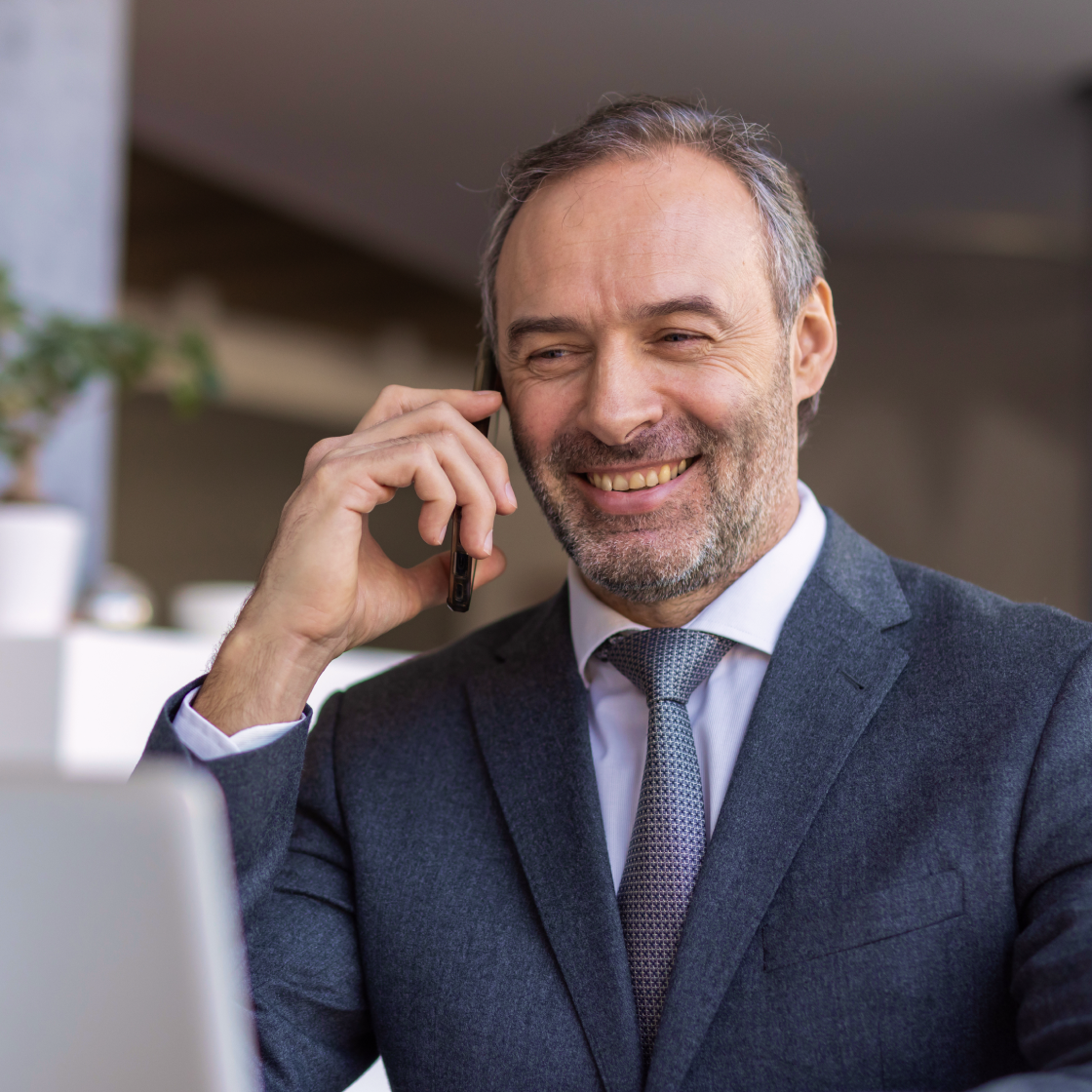 senior-criminal-defense-attorney-taking-urgent-phone-call.png
