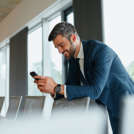 Attorney checking legal updates on mobile phone