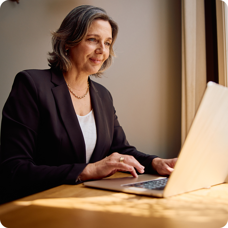 senior-female-attorney-looking-into-case-file