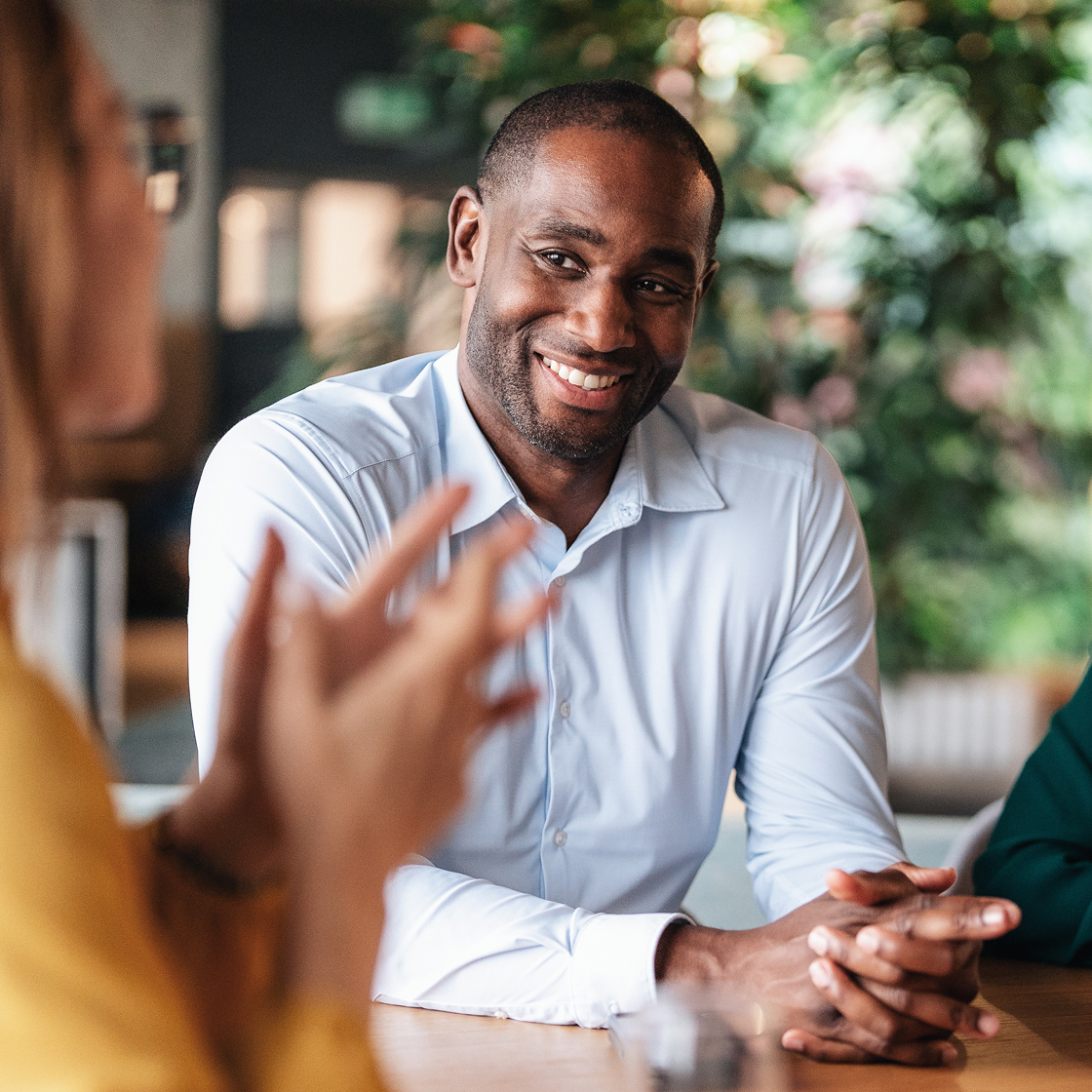 Small law firm meeting together to collaborate