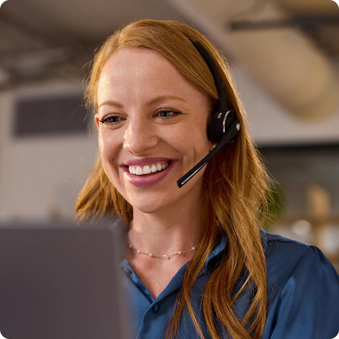 joyful-woman-support-coordinator-handling-inbound-calls