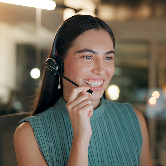 Happy female receptionist answering