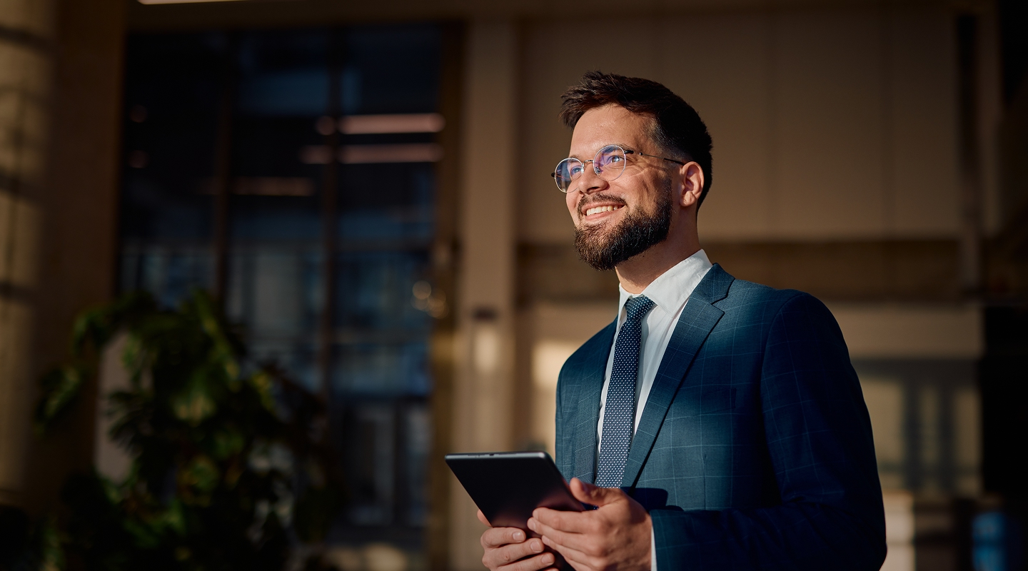 optimistic lawyer holding a tablet