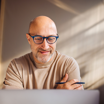 Relaxed lawyer looking at computer