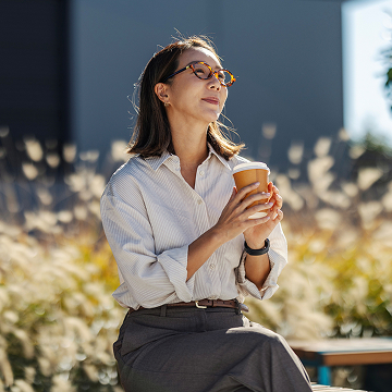 Relaxed lawyer on a coffee break outside